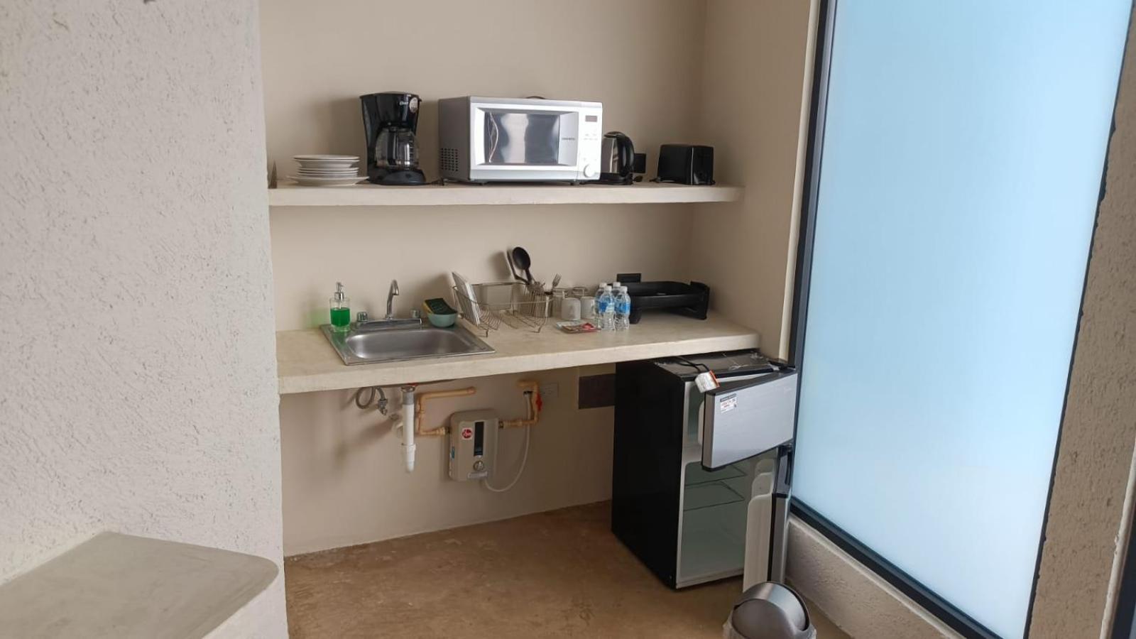 Aparthotel Xuva Mérida Habitación foto